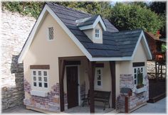 a small house made out of bricks and stone