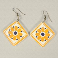 yellow and blue square shaped earrings with flower design