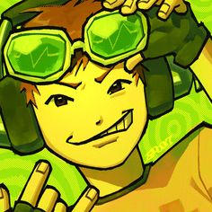 a boy wearing headphones and green goggles with his hands up to his ears