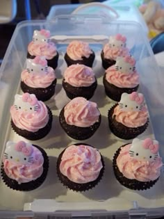 hello kitty cupcakes with pink frosting in a plastic container