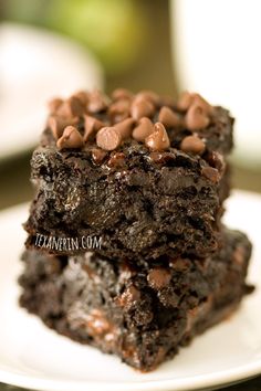 two brownies stacked on top of each other with chocolate chips in the middle,