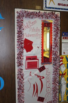 a bulletin board with red and white decorations