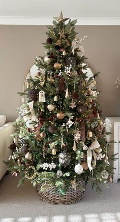 a decorated christmas tree in a living room