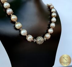 "◎ Statement necklace made from natural freshwater pearls in 4 colors ( white, silver, peach and pink ). Adorned with decorative floral ball element and filigree pearl caps. Everything is handmade from solid sterling 925 silver. ★ ◎ Length: 48 cm ( 18.9\" ) Diameter of the silver ball elements: 1.8 ( 0.70\" ) ◎ Enter the shop, for more of our jewelry, and matching earrings ;) ◎ - - - - - - - - - - - - - - - - - - - - - - - - - - - - - - - - - - - - - - - - - - - - - - - - - - Jewelry will be pac Traditional Single Strand Pearl Necklace For Wedding, Elegant Gold Pearl Necklace With Silver Beads, Silver Bridal Necklace With Round Beads, Elegant Silver Beads Bridal Necklace, Handmade Bridal Necklace With Round Beads For Anniversary, Pearl White Necklaces With Silver Round Beads, Elegant Pearl Necklace With Silver Round Beads, Pearl Necklace With Silver Beads As Gift, Elegant Pearl Necklace With Silver Beads