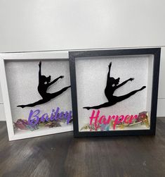 two framed photos with the words happy and ballerina on them, one is black