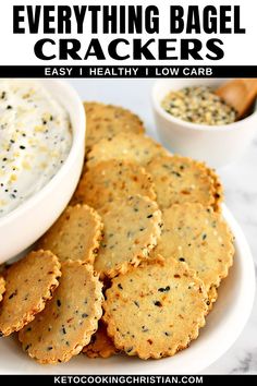 everything bagel crackers on a white plate with dip in the background and text overlay that reads everything bagel crackers easy healthy low carb