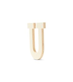 the letter u is made out of wood and sits on top of a white surface