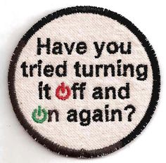 a patch with the words have you tried turning it off and on again?