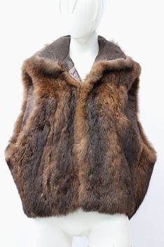 More than just a pretty picture.  Try Vendio Image Hosting.   DESCRIPTION: BEAUTIFUL & VERY STYLISH BROWN OPOSSUM FUR VEST FOR WOMEN! IT CAN BE WORN UNDER A WINTER JACKET/COAT. THE COLLAR TYPE IS "WING", IT CLOSES WITH ZIPPER CLOSURE AND HAS TWO SIDE POCKETS. THIS ITEM IS PRE-OWNED: THE FUR IS "MINT", THE SECOND BEST CONDITION AND THE INSIDE LINING IS "EXCELLENT", THE BEST CONDITION POSSIBLE!  AFTER BUYING THIS ITEM, IT WOULD BE VERY MUCH A Mink Sleeveless Winter Vest, Fur Vest Women, Fashion Dark, Wing It, Vest For Women, Vest Women, Second Best, Winter Coats Jackets, Fur Vest