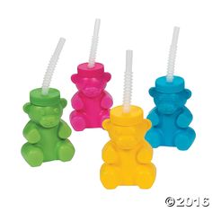 four different colored bears with straws in them