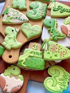 some decorated cookies are sitting on a table