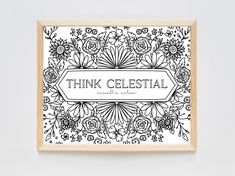 a black and white print with the words think celestial on it in front of a wooden frame