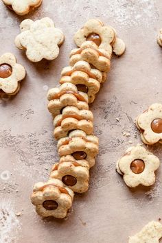 some cookies are arranged on a baking sheet