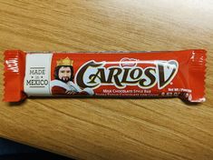 a bar of candy sitting on top of a wooden table