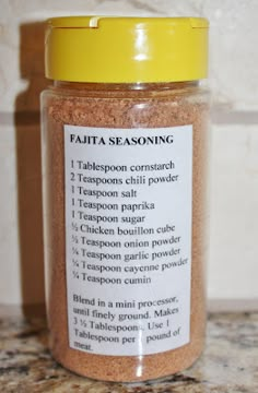 a close up of a jar of seasoning on a counter