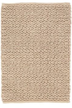 a beige rug on a white background with an area for text or images to be added