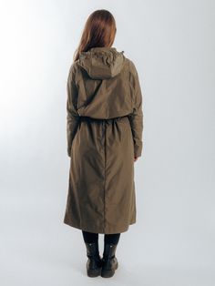 Stay dry and stylish in our women's long raincoat with a hood.
Water resistant for reliable protection against rain. Constructed from 100% Polyester memory fabric that maintains shape, perfect for travel.
Includes built-in travel pocket for added convenience. Adjustable drawcords at waist and hood for versatile, feminine styling Stylish Rain Boots, Raincoat With Hood, Long Raincoat, Long Rain Coat, Sherpa Vest, Wool Overcoat, Shape Shifting, Hooded Raincoat, Rainy Day Outfit