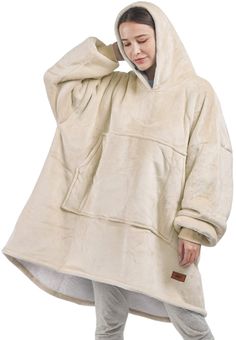 PRICES MAY VARY. WHY WEAR A BLANKET? EVERYONE lounges around their own home in the same comfy clothing, whether it's pajamas or comfy oversized blankets. Now you can conveniently wear a soft sherpa big hoodie every day in your home or even outside. FLUFFY SHERPA INTERIOR, SILK-FLEECE EXTERIOR: DONT YOU HATE IT WHEN your cold and your hoodie or blanket rides up on your belly, arms and ankles?! Never worry about cold air sneaking in with our wearable blanket, the arms have elastic cuffs to stay in Blanket Hoodie Green, Cheap Hoodie For Fall Leisure, Cheap Gray Sweatshirt With Drawstring Hood, Comfys Blanket Hoodie, Over Sized Blanket Hoodie, Over Sized Hoodie Blanket, Cheap White Hooded Outerwear, Big Hoodies Oversized Sweaters, Casual Hoodie For Cold Weather, Affordable