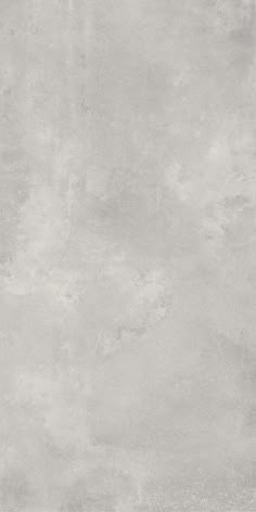 a white and gray concrete wall textured with light grey paint or cement, for use as a background