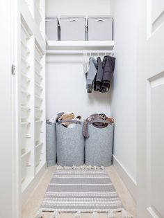 the closet is clean and ready to be used as a storage area for clothes or other items