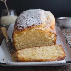 a loaf of pound cake sitting on top of a white plate