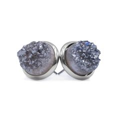 Introducing, the Stone Collection - Silver Stormy Quartz Stud Earrings: Our Stone Collection earrings draw similarities to our Regal Collection stud earrings; these however, are comprised of circular quartz stones that add a taste of class to every outfit. The quartz stones have a rocky texture, much like our Bangle Collection Quartz Bracelets. Be certain that these beautiful earrings pair well when you want to have an elegant night with that special someone or impress when you go out for a nigh Faceted Sterling Silver Crystal Earrings Gift, Black Quartz Earrings, Silver Rose Quartz Earrings For Gift, Bangle Collection, Faceted Smoky Quartz Jewelry For Gift, Smoky Quartz Earrings, Stud Earrings Silver, Stone Collection, Velvet Pouch