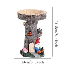 an image of a tree stump with gnomes and mushrooms in the hole on it