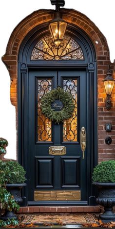 a black front door with a wreath on it