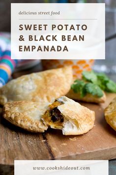 sweet potato and black bean empanada on a cutting board with text overlay