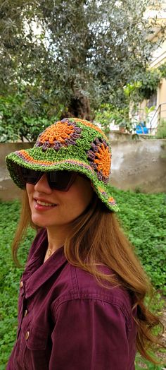 NEW SPRING/SUMMER CREATION Neon green and orange colored granny square flower crochet bucket hat. Cute and stylish granny square bucket hats hand crocheted with trendy color palettes in 2024. ✔️ DESIGN: These hats are  great for spring /summer, holidays, and festivals. They have stylish look in vintage, boho style, great with any outfit, suited for outdoor activities, and casual wear in bright colors .They are a nice treat for yourself, as well as thoughtful presents for friends or valentines. ✔ Green Yarn Sun Hat For Summer, Handmade Green Crochet Hat, Casual Style, Green Bohemian Crochet Hat For Vacation, Orange Crochet Beach Hat One Size, Green Casual Crochet Hat For Festival, Casual Green Crochet Hat For Festival, Green Crochet Bucket Hat For Summer, Green Wide Brim Bucket Hat Made Of Yarn, Green Crochet Summer Hat For Beach