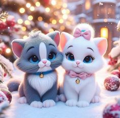 two little kittens sitting next to each other in front of a christmas tree with lights