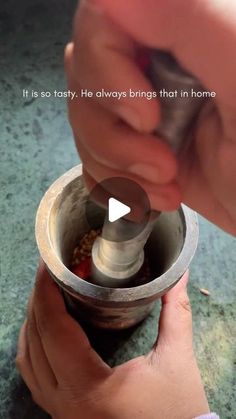 a person is using a grinder to make something out of the bottom of a bowl