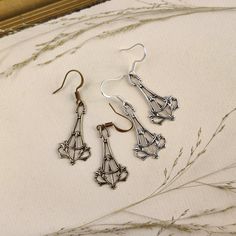 Victorian Thor Hammer Filigree Earrings in Brass or Antiqued Silver | Ragtrader Vintage Thor's Hammer, Filigree Earrings, Earring Hooks, Drop Earring, In Water, Vintage Stil, Thor, Antique Brass