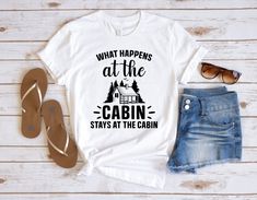 "What Happens at The Cabin Stays at The Cabin Shirt, Funny Camping Shirt, Camper Shirt, Camping Shirt, Adventure Shirt, Camp Lover Shirt * Processing time is 1 business day (there may be exceptions during holiday seasons). Delivery time is based on your shipping type selection and location. Please check the estimated delivery times at checkout and upgrade the shipping at checkout if you need it sooner. * All items are made-to-order. Because of the nature of these items, unless they arrive damaged or defective, we cannot accept return or exchange. * Please review the all size charts displayed in the product images.  * Please note that the sizing chart includes the measurements of one side of the shirt, not the circumference.  * Sizing might differ 1\" (+-) from brand to brand. We recommend What Happens At The Cabin Stays, Family Cabin Trip Shirts, Couples Trip, Camping Shirts Funny, Cabin Trip, Travel Tshirt, Family Reunion Shirts, Reunion Shirts, Funny Camping