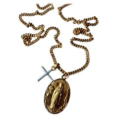 One of a kind Vintage or possibly Antique Virgin Mary Medal From France That has recently been Gold Plated and a Light Blue Enameled Cross on a Long Gold Plated Chain Necklace 72 cm Long Designer: J DAUPHIN Available for immediate delivery Enamel Cross, Chunky Chain Necklaces, Cross Chain, Necklace Chain Lengths, Long Chain Necklace, Modern Necklaces, Chain Choker Necklace, Religious Jewelry, Silver Chain Necklace