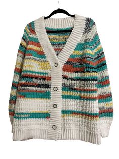 This is a very textured Raglan style cardigan with matching Hat. It's crocheted with a soft acrylic yarn.🧶  This color is called Painted Canyon and Antique White for the ribbing.    Care: Hand Wash for best results but can be washed on gentle cycle  Size: XLarge Length: 28" Sleeve: 22" Width: 47" Material: Acrylic Yarn 🧶  Smoke Free Home Casual Yarn Cardigan For Fall, Casual Knit Yarn Cardigan, Casual Yarn Outerwear For Fall, Winter Knit Yarn Cardigan, Casual Acrylic Yarn Knitted Cardigan, Casual Long Sleeve Cardigan, Casual Hand Knitted Cardigan, Knit Yarn Cardigan For Fall, Winter Crochet Knit Cardigan