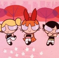 the powerpuff girls are flying through the air