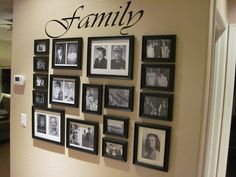 a wall with family pictures on it and the word family written in cursive writing