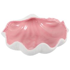 a pink and white shell shaped bowl