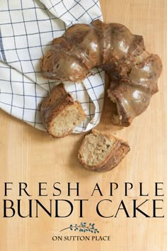 fresh apple bundt cake with brown sugar glaze on a cutting board next to a napkin