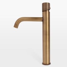 a brass colored faucet is shown on a white background, with the handle extended