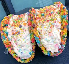 there are two pieces of cake covered in sprinkles