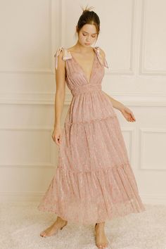 This gorgeously glam gown with its metallic-flowered skirt ruffles is a timeless must-have for any elegant soiree, with its deep V-neck, cinched empire waist, capped fluttery sleeves, and tiered ruffle 'skirting' off the style.Material:Polyester Glam Gown, Skirt Ruffles, Dusty Pink Dresses, 2023 Clothing, Bridesmaid Dresses Boho, Whimsical Dress, Floral Bridesmaid Dresses, Romantic Floral Print, Floral Bridesmaid