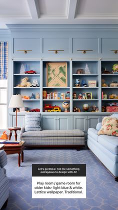 a living room filled with furniture and lots of blue bookshelves on the wall