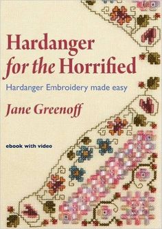 the cover of a book with an embroidered border and flowers on it, which reads, '