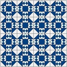 a blue and white quilt with squares on it