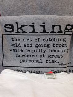 a t - shirt with the words skiing printed on it