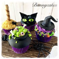 three cupcakes decorated with halloween decorations and witches hats