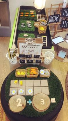 a table topped with lots of food on top of a wooden floor