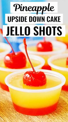 pineapple upside down cake jello shots in plastic cups with cherries on top